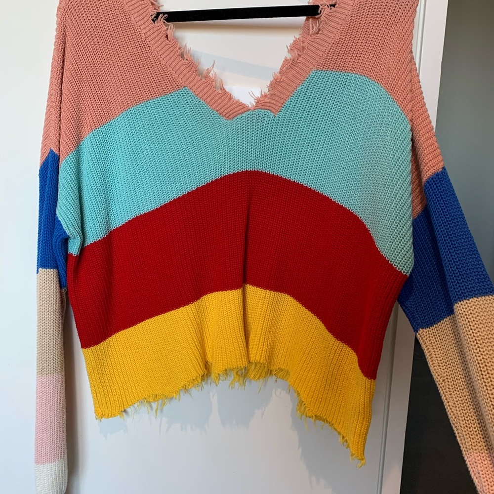 Distressed color block sweater